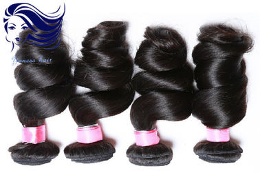 Porcellana Le estensioni ricce vergini dei capelli umani per le donne di colore allentano Wave fornitore